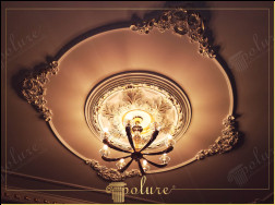 Decorare tavan living ornament poliuretan Decorul din poliuretan pentru decorarea tavanului livingului este modalitatea perfectă de a crea o atmosferă modernă și elegantă. Materialul poliuretanic se remarcă prin structura sa ușoară și durabilitate și oferă o soluție decorativă de lungă durată integritate estetică.