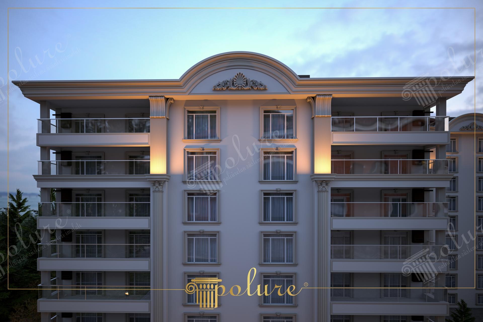 Fațadă de clădire rezidențială decorată cu pilastri canelați, ancadramente și fronton din poliuretan iluminat.