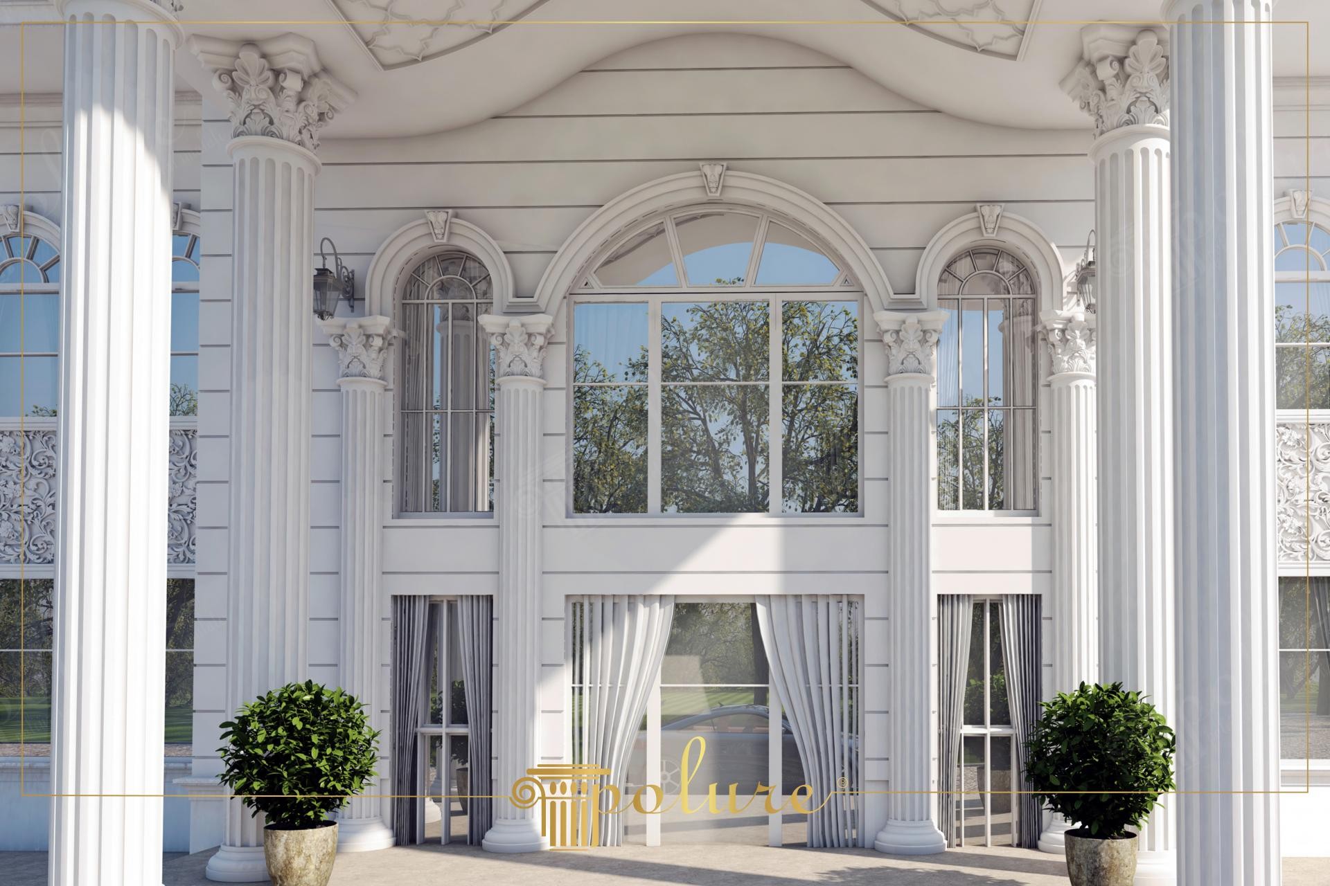 Fațadă albă de vilă clasică cu coloane din poliuretan, arcuri decorative și panouri cu basorelief la exterior.