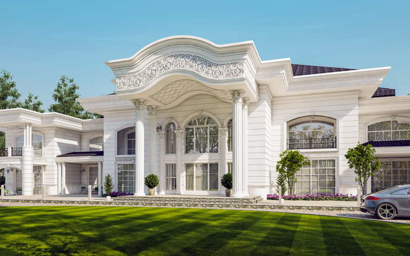 Fațadă albă de vilă cu coloane corintice din poliuretan, ancadramente ornamentale și arcadă sculptată pe intrare.
