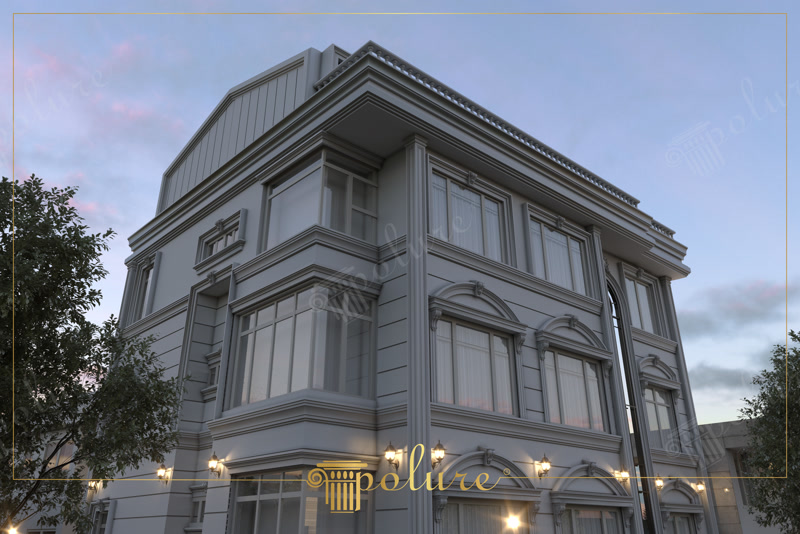 Fațadă modernă gri decorată cu ancadramente, arcade și pilastri din poliuretan cu iluminat arhitectural nocturn.