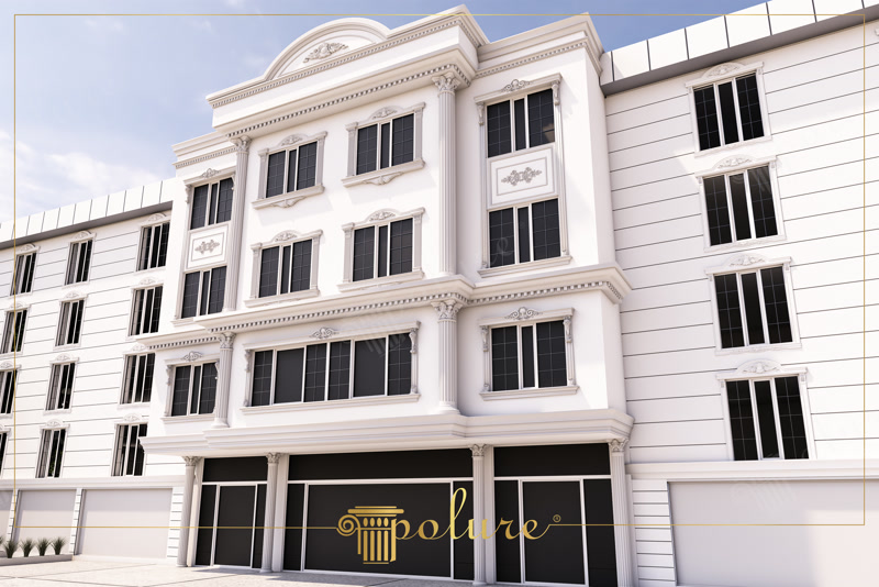 Fațadă clasică de clădire cu profiluri decorative din poliuretan albe, pilastri și ancadramente pe fond alb.