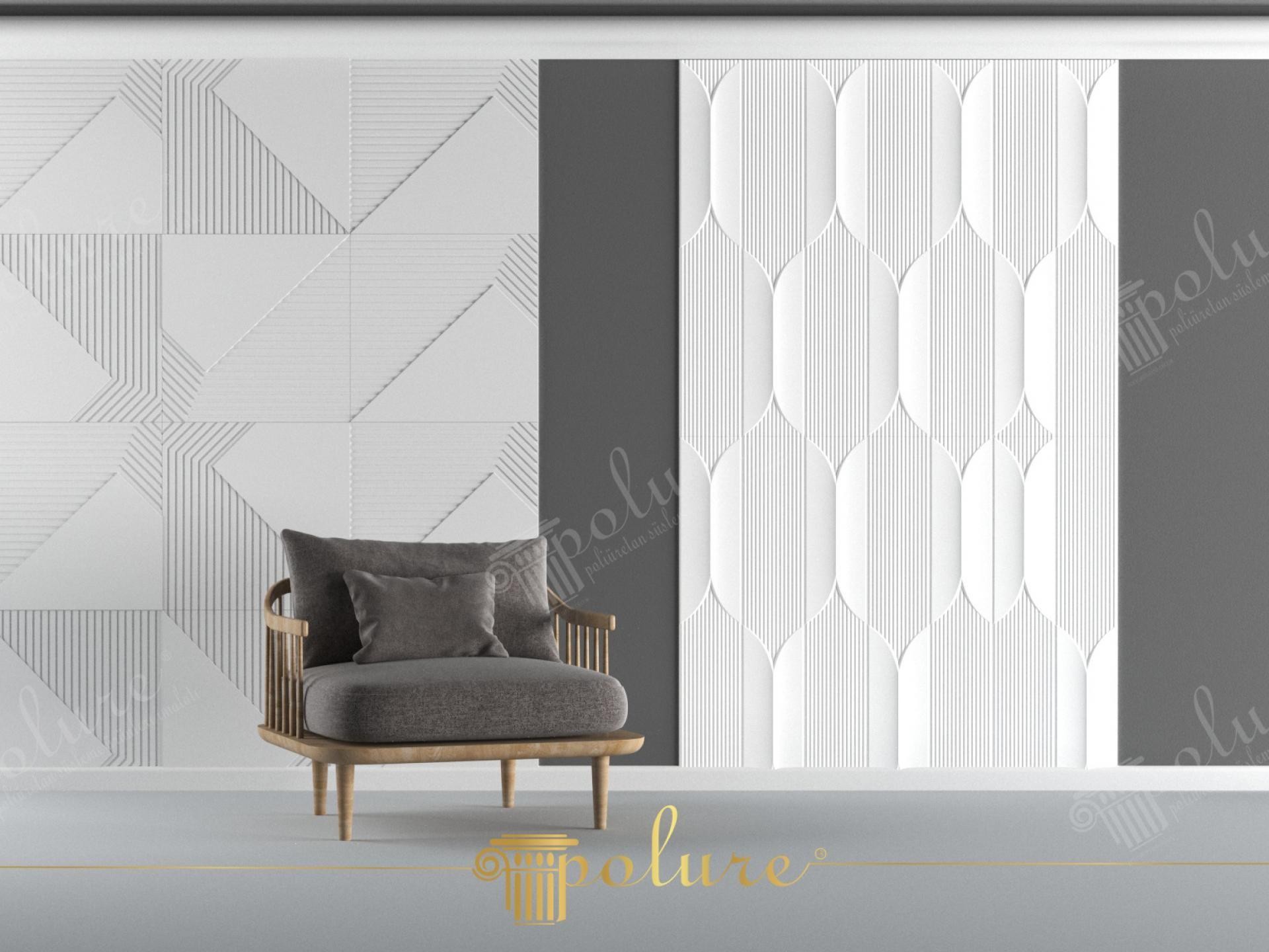 Panouri decorative din poliuretan albe cu modele geometrice și curbate pe un perete accent gri antracit.
