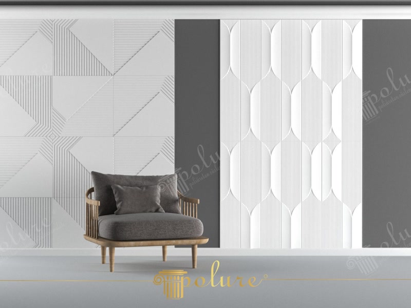 Panouri decorative din poliuretan albe cu modele geometrice și curbate pe un perete accent gri antracit.