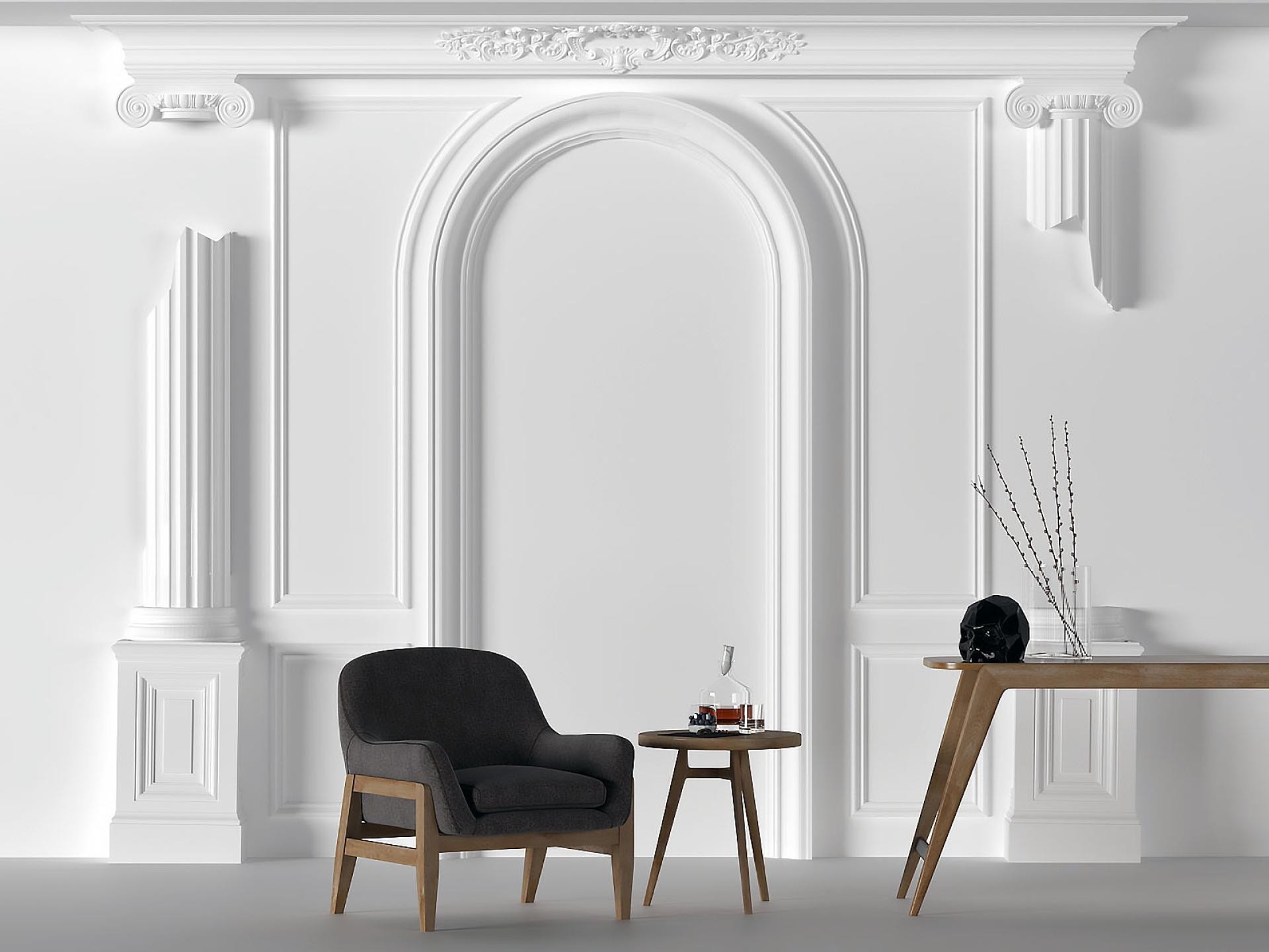 Perete decorat cu arcadă din poliuretan P1470D101VI, pilatri și fotoliu modern pe fundal alb pătat.
