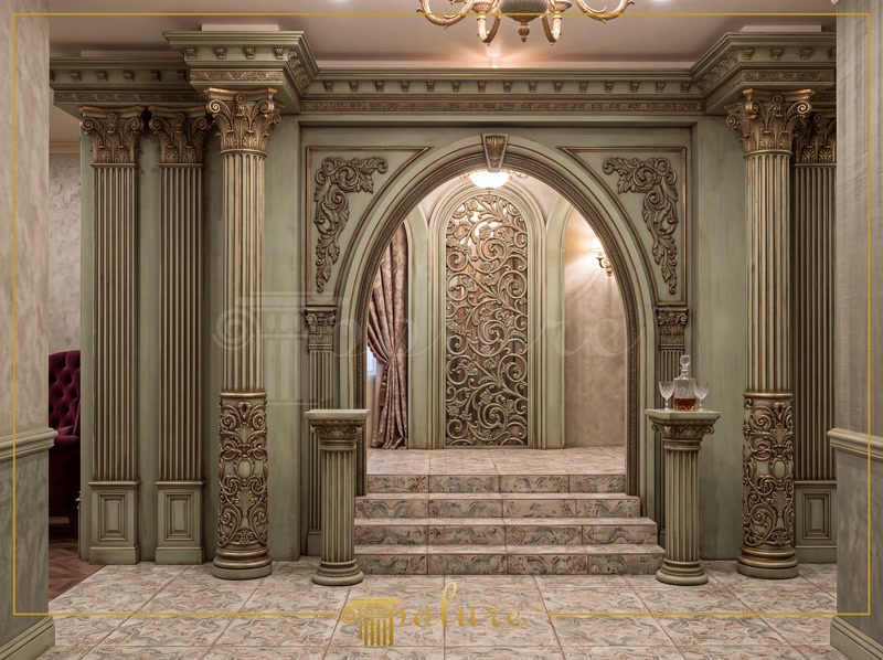 Arcada neoclasica din poliuretan cu coloane canelate si detaliu auriu antichizat intr-un interior elegant.