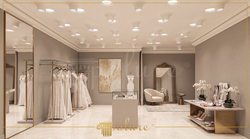 Plafon modern dintr-un showroom decorat cu profile din poliuretan și corpuri de iluminat organic încastrate.