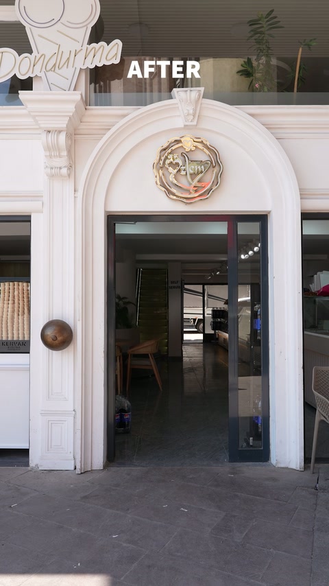 Intrare arcuită evidențiată prin ancadrament profilat și pilaștri decorativi